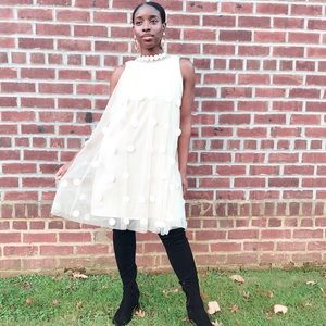 Sleeveless halter dress.